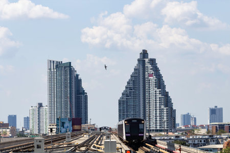 BTS Sky Train running in downtown of Bangkok on daytime, Sky train is fastest traffic transport mode...