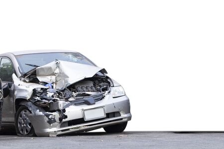 Front of silver car get damaged by accident on the road isolated on white background.の写真素材