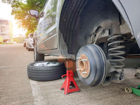 Car wheel repairing outdoor service,  safety concept to reduce road accidents.の写真素材