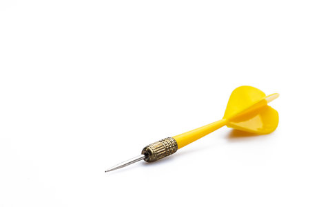Yellow darts Isolated on white background, goal setting concept for success.の写真素材