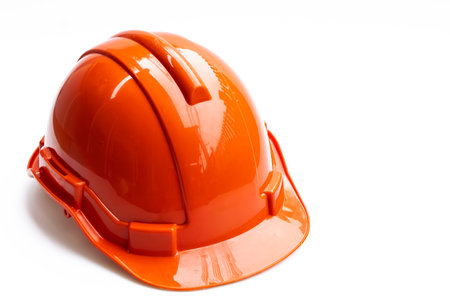 Red engineer helmet isolated on white background..の写真素材