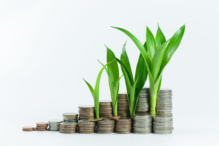 Money, Financial, Business Growth concept, Man's hand put money coins to stack of coinsの写真素材