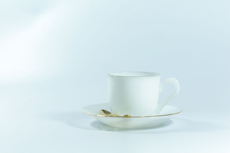 Empty White Cup on White Background