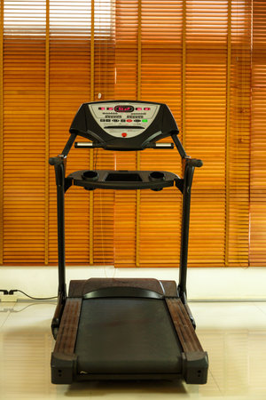 Interior modern fitness center Gym room with equipment .