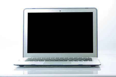 laptop on table and white background