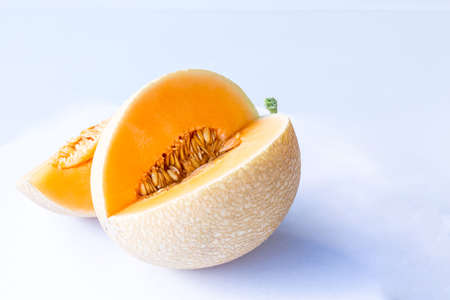 Cantaloupe or melon slices isolated on white background.の写真素材
