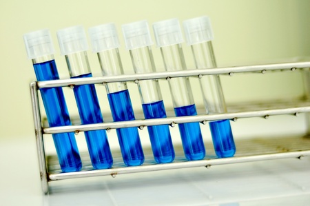 Test tubes with colored reagentの写真素材