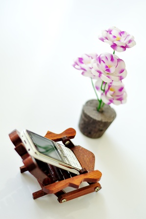 A Mobile phone on the holderの写真素材