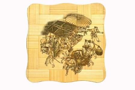 A bamboo saucer on white backgroundの写真素材