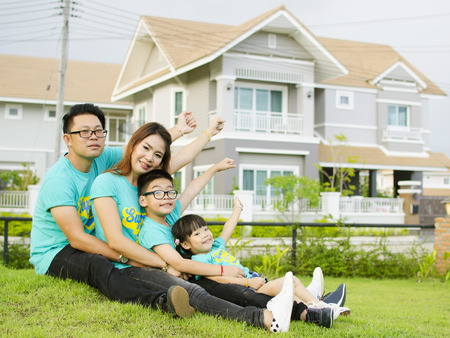 Asian family play together in the gardenの写真素材