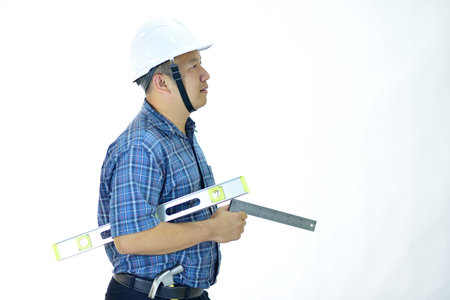 Portrait of Asian male engineer on white background