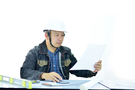 Portrait of Asian male engineer on white backgroundの写真素材