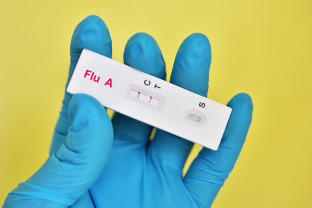 Influenza A virus positive test result by using rapid test deviceの写真素材