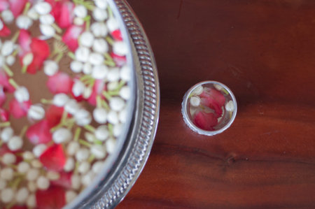 jasmine and rose corolla in small bowlの写真素材