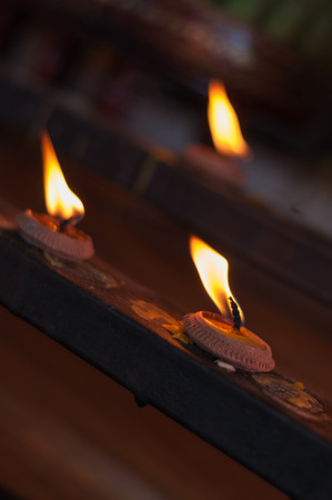 candle flame with windの写真素材