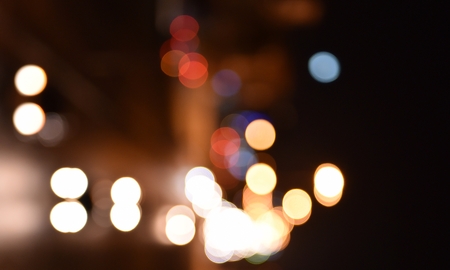 Beautiful blur background on dark, out of focus lights of the car at night,の写真素材
