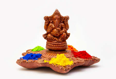 colorful traditional happy holi color powder with Lord Ganeshaの写真素材