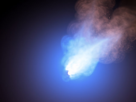 Smoke from the chimney on a dark blue background close-up