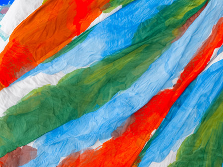 abstract background with colored crumpled tissue, closeup of photoの写真素材