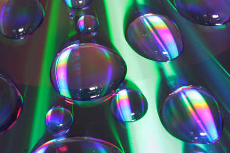 Close up of drops on CDの写真素材
