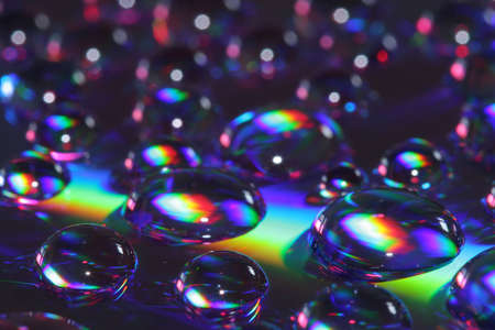 Close up of drops on CDの写真素材