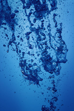 Abstract blue background of drops of water