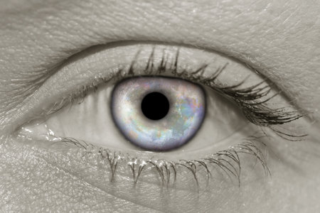 Moon reflected in woman's iris