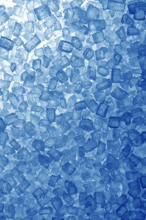 Salt grain illuminate with blue lightの写真素材