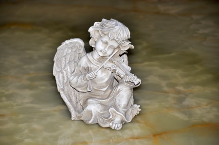 Figurine of an angel playing the violinの写真素材