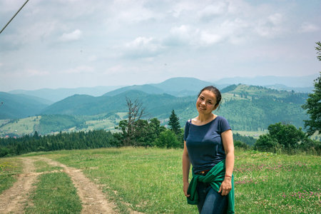 girl in forest with beautiful landscapeのeditorial素材