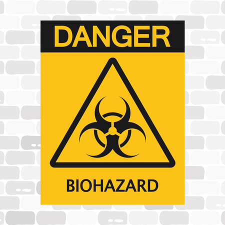 "Caution" biohazard sign screwed into a brick wall, warning of radiation toxicity. Black and yellow banner.のイラスト素材
