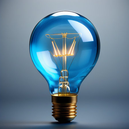 Incandescent lightbulb on blue background. 3D renderingの素材