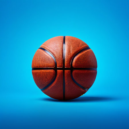 Basketball ball isolated on blue background. 3d render illustration.の素材