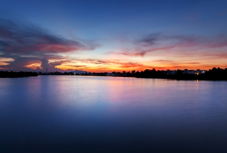 Nature view of sunset by the riverの写真素材