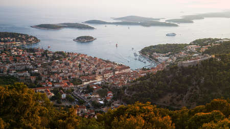 Historical Center, Spanjola / Fortica Fortress and Port of City of Hvar with Pakleni / Paklinski Islands in the Background, Hvar Island, Dalmatia, Croatiaの写真素材