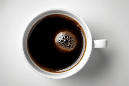 Cup of coffee on white background, top view. Space for textの素材