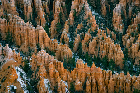 Far away zoom shot of bryce canyon national park of the hoodoos at inspiration point during the winter months in southern utah usaの写真素材