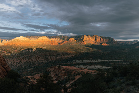Sun setting on the eastern mountain in Sedona Arizona in January.の写真素材