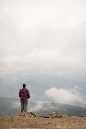 Young caucasian woman hikes at Hurricane Ridge in Olympic National Park in Washington State.の写真素材