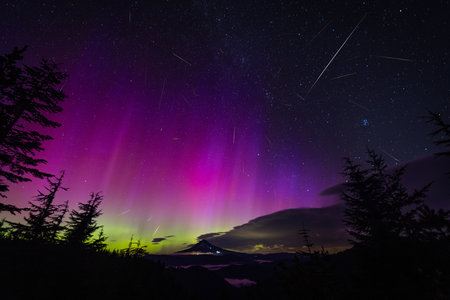 Incredible Northern Lights dance over Mount Hood during the peak of Perseids Meteor Shower on August 13, 2024.の写真素材