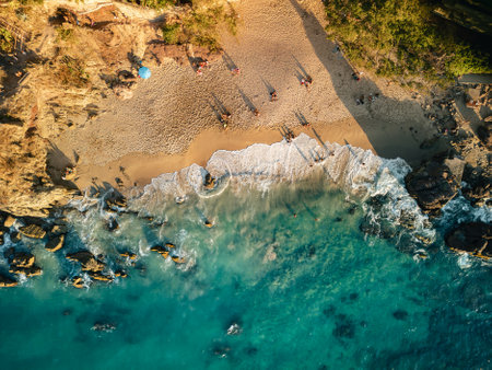 Top down Arial View of Play Amapas with blue turquoise waves crashing onto beautiful sandy beach.の写真素材