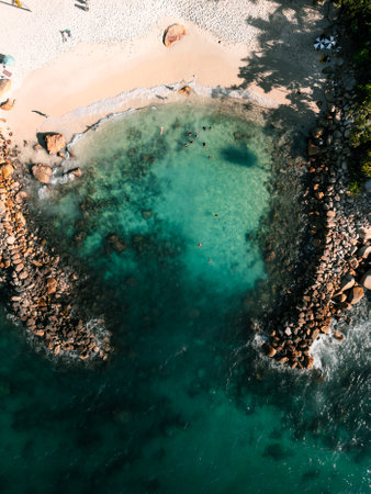 Top down view of Playa Esmeralda in Puerto Vallarta Mexico with crystal clear blue ocean water.の写真素材