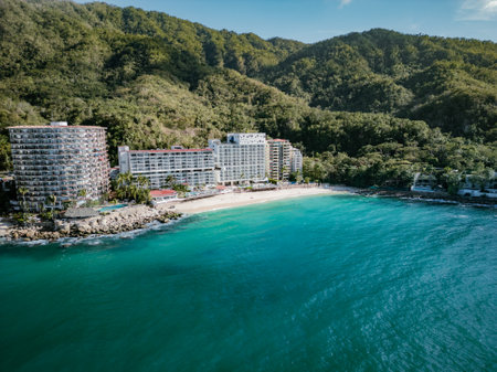 Wide aerial view of Puerto Vallarta Mexico on perfectly blue turquoise ocean water.の写真素材