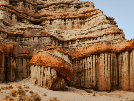 Horizontal photo of Red Rock Canyon State Recreation Area in California showing deep red hues of iron in sandstone.の写真素材