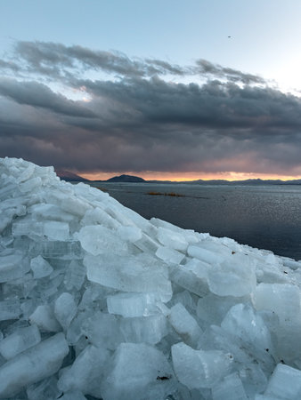 Ice stacks on Utah Lake during blue hour.の写真素材