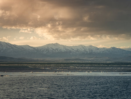 Mountains at sunset at Vineyard Beach on Utah Lake in Utah at sunset in February 2025.の写真素材