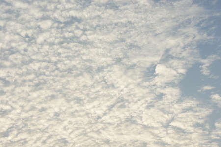 Blue sky with cloudsの写真素材