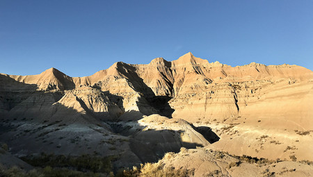 Panoramic view of the dramatic landscapes of Badlands National Parkの写真素材