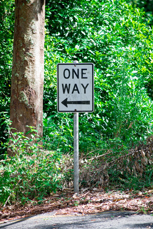 ONE WAY sign taken nearby Brisbane city in Queensland, Australia. Australia is a continent located in the south part of the earth.の写真素材