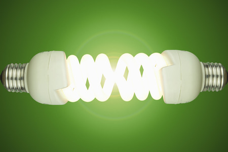 Low energy light bulbs joined together glowing